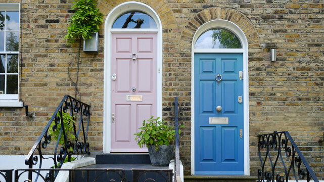 London pastel color doors on brick wall building