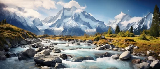 Papier Peint photo Mont Blanc A painting depicting a mountain stream flowing through the majestic Alps, with Mont Blanc towering in the background. The glistening peaks and glacier add to the grandeur of the scene.