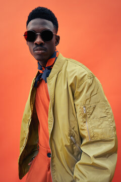Black fashionable man model in stylish bomber jacket