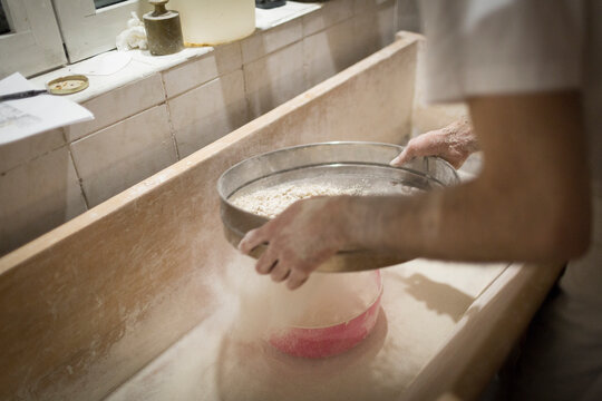 Baker sift the flour