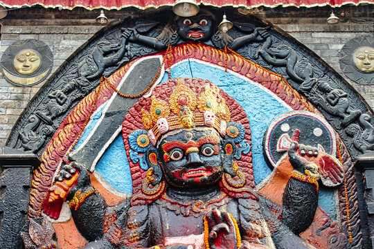 Kaal Bhairav - An open air temple with a powerful manifestation of the Hindu god Shiva built in black stone by King Pratap Malla  at the center of the historic Durbar square in Kathmandu,Nepal
