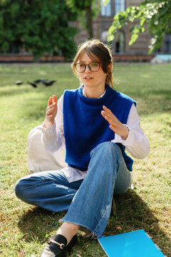 Undergrad tutor speak guidance gesticulate park zone back to school