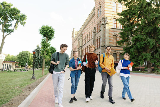 Classmate college student walk campus pastime chill out connection fun