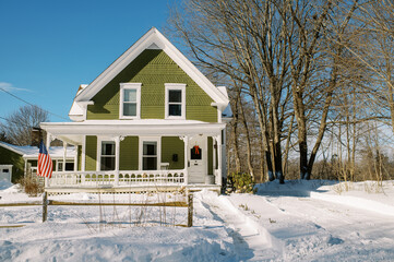 Green house in new england after snow storm in winter