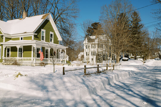 Green house in new england after snow storm in winter