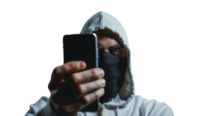 Portrait of a hacker threatening and holding a mobile phone on a transparent background