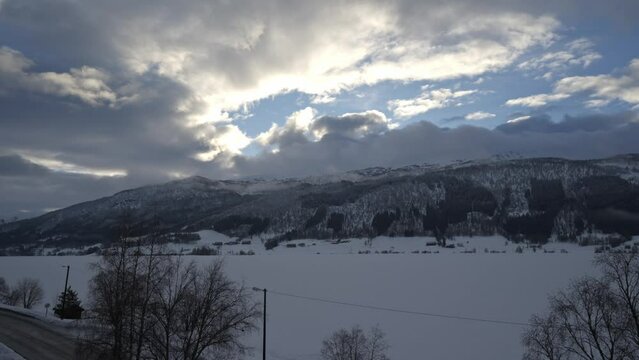 Oppheimsvatnet lake In Voss Norway, Winter Time Lapse with passing clouds