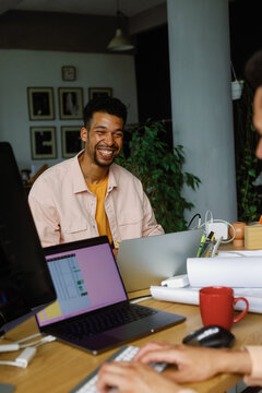 Employee co-working laugh emotion modern profession humour workplace