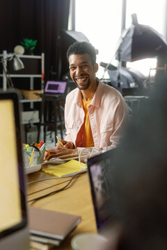 Co-working hub happy uplifting feeling tech modern team photo editor 