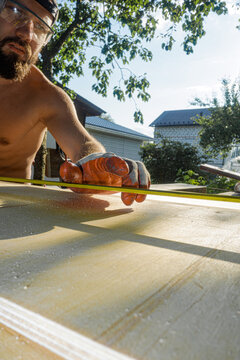 Worker Master With Construction Tape For Measuring 