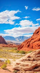 Fototapeta premium Panoramic landscape view of beautiful red rock canyon formations during a vibrant sunny day