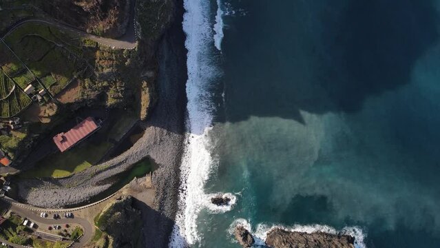 Immerse yourself in the surreal beauty of Madeira's cliffside scenery captured from a unique aerial viewpoint
