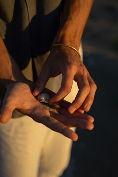 Holding Seashell