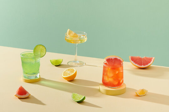 three kinds of colorful summer cocktails in glasses