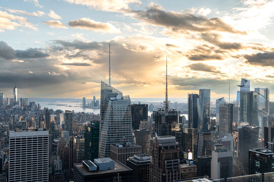 Cityscape with skyscrapers and world trade center at sunset