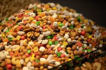 Sale of nuts. There are a lot of nuts on the market. Fruit stand.