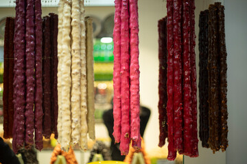 Fruit jelly on a stick. Sale of natural sweets. Delicious fruit food.