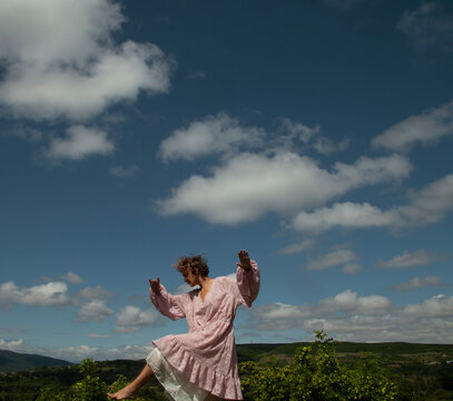 Girl is dacing in the sky