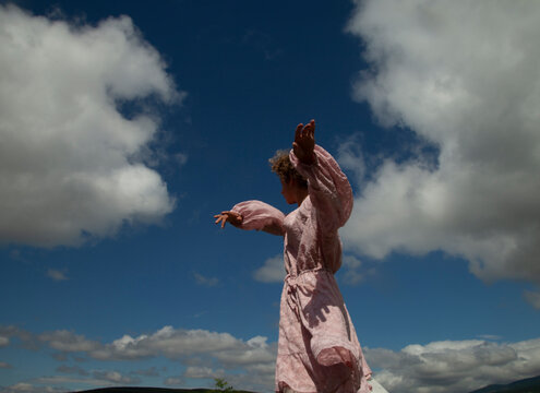 Girl is dacing in the sky