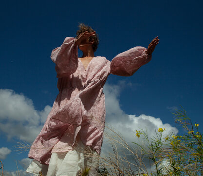 Girl is dacing in the sky