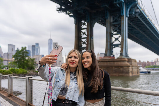 Two Tourist Women Taking A Selfie In New York.
