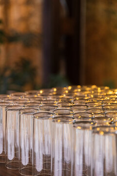 Tall transparent glasses on a row with copy space