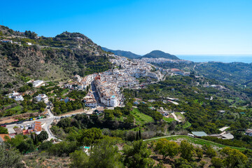 Fototapeta na wymiar Panoramic view of the white hillside village of Frigiliana Spain