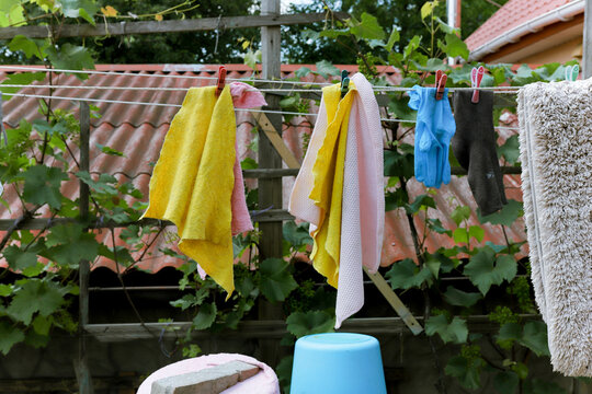 rags are dried on a rope