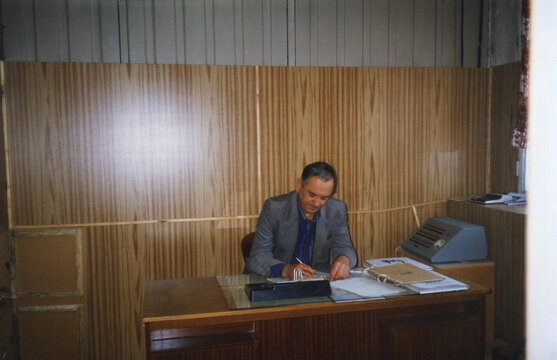 man working with documents in office