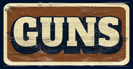 Aged and worn guns sign on wood - 751149140