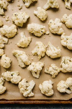 Raw Cauliflower On a Baking Sheet