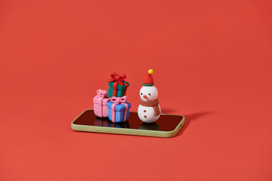 Christmas decorations on smartphone screen