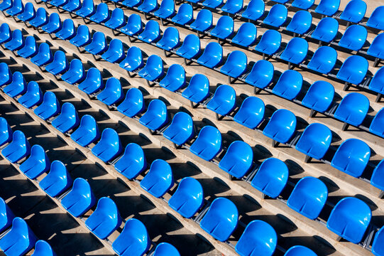 Empty blue seats in a stadium