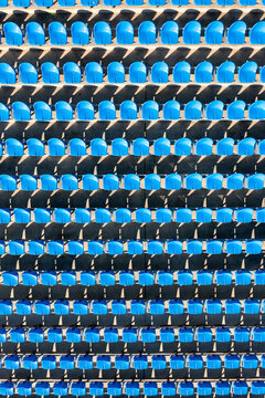 Empty blue seats in a stadium