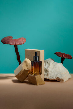 One brown bottle of cosmetics on a natural beige background.