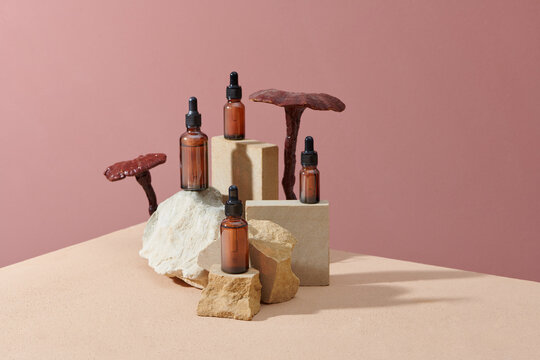 Dark amber glass bottle standing on stone. 