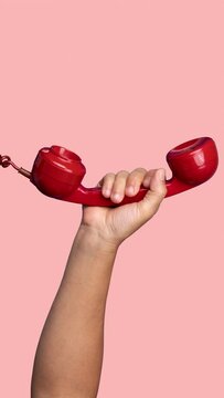 red vintage telephone handsets in vertical