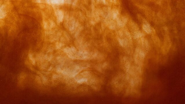golden liquid smoke filled with particles, epic orange abstract paint dye visual in bright slowmotion