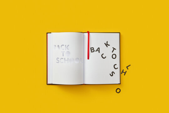 Notebook with black Back to school letters.