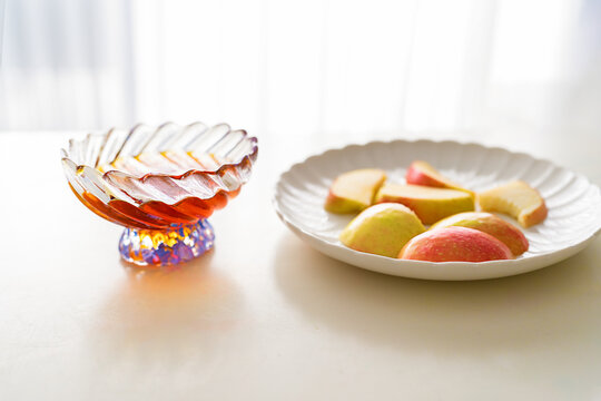 Rosh Hashanah Still Life: Honey, Sliced Apples, and Daylight Serenity