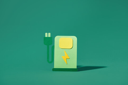 Charging station with electricity sign, cable and plug