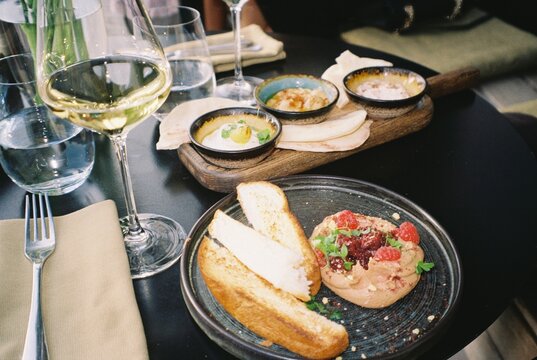 Snacks for white wine in an outdoor restaurant in summer 