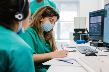 Group of surgeons during robotic electrophysiology