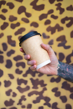 Coffee cup in hand