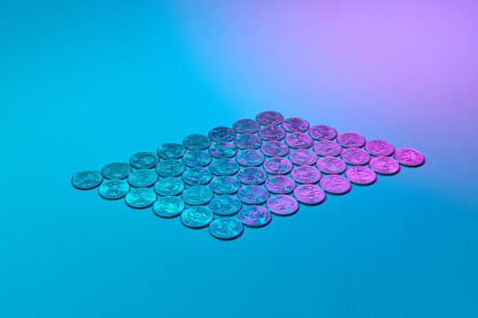 Cent coin laid out in rows.