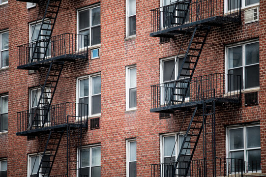 Exterior of brick building with balconies