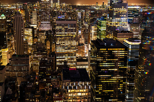 Illuminated mega city with skyscrapers at night