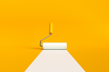 Paint roller brush painting a white line on yellow background. - obrazy, fototapety, plakaty