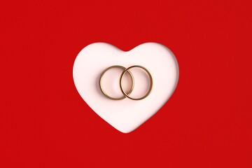 Golden wedding rings inside of a cut out heart shape on red background. - obrazy, fototapety, plakaty