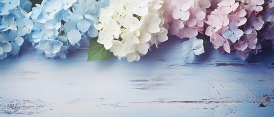Spring floral background Fresh blooming colorful Hydrangea Flowers on soft gray vintage wood background created with Generative AI Technology 